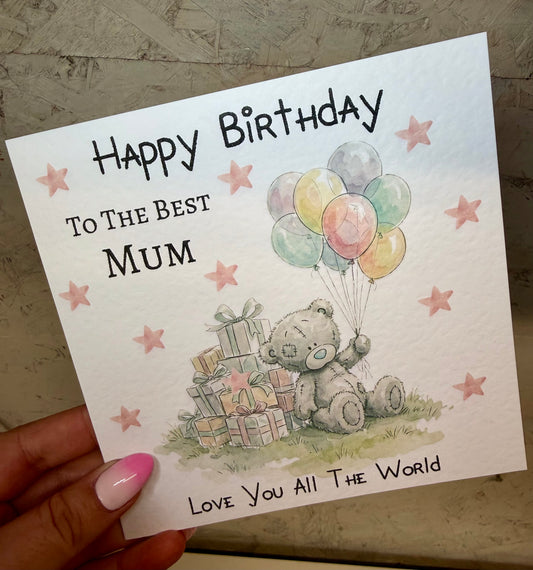Birthday card for the best mum with a teddy bear holding balloons and presents.