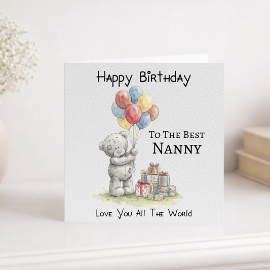 Birthday card for the best nanny with a teddy bear holding balloons and presents.