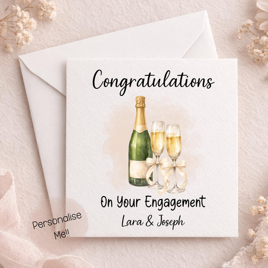 Personalised engagement card with champagne glasses and custom names for couple