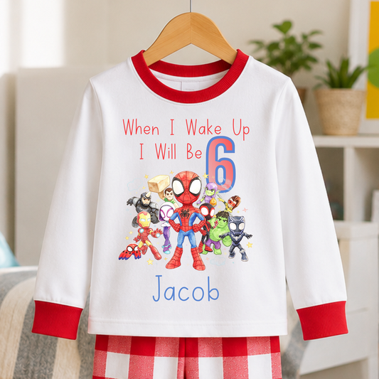 Personalised Spidey birthday pyjamas with When I Wake Up I Will Be 6 design, superhero characters, custom child's name and red and white pyjamas.