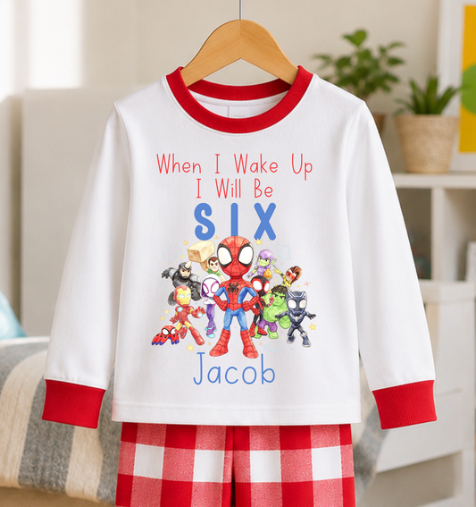 Personalised Spidey birthday pyjamas for kids with When I Wake Up I Will Be Six wording, superhero character design, custom name and red checked bottoms.